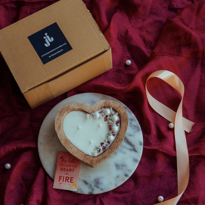 Wooden heart candle